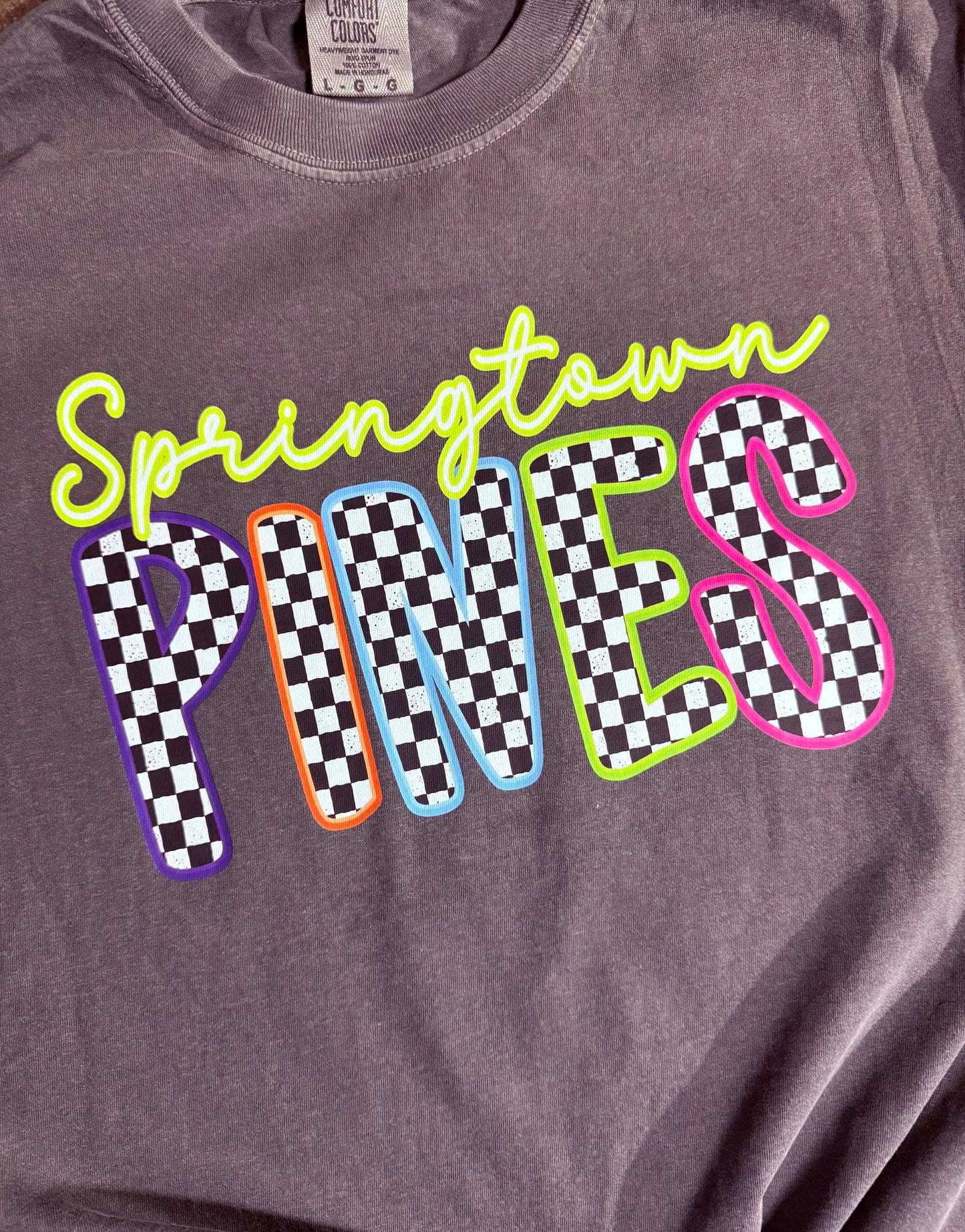Neon checkered Springtown Pines tee